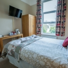 Cosy Sea View Room Overlooking Garden and Thatcher Rock (2)
